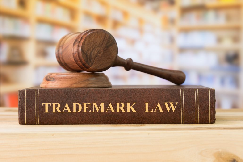 Trademark Law Book With Judges hammer?