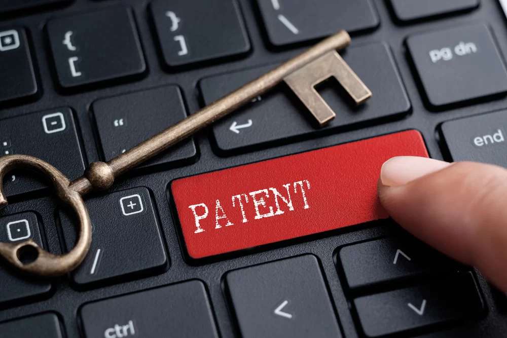Patent is the key with keyboard background