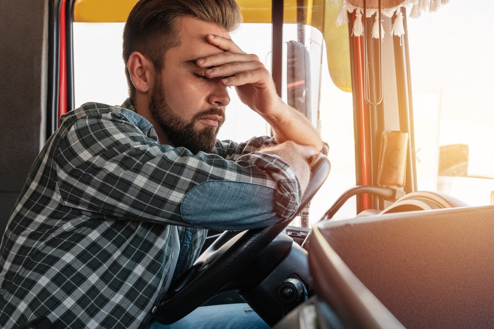 Photo of a Tired Truck Driver